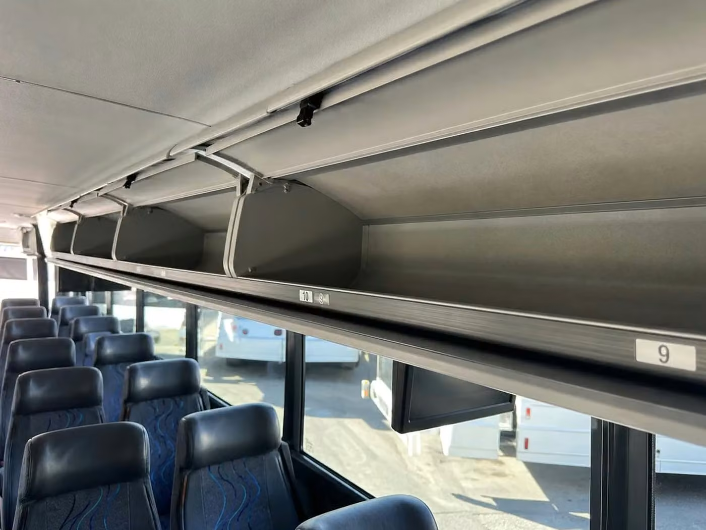 paragould charter bus overhead storage